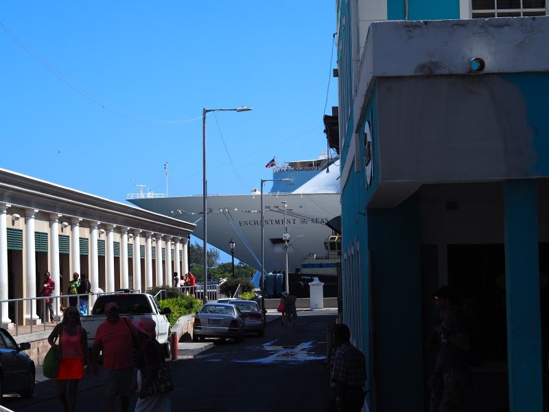 Down a side street on Nassau, Enchantment of the Seas can be seen