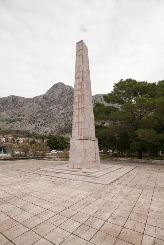 A memorial to World War II veterans near the dock in Kotor, Montenegro.