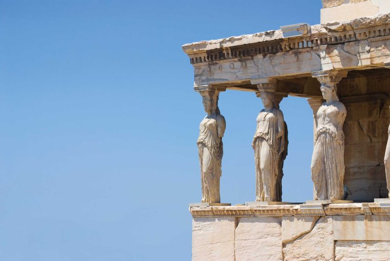 See the massive female statues called the Porch of the Caryatids at Erechtheion temple at the Acropolis in Athens, Greece.