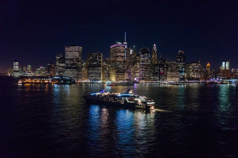 See the magnificent skyline of Manhattan at night on a Ponant cruise.