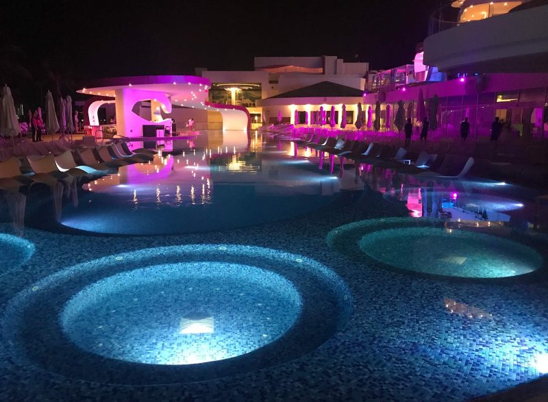 The sexy pool at night at Temptation Cancun Resort.