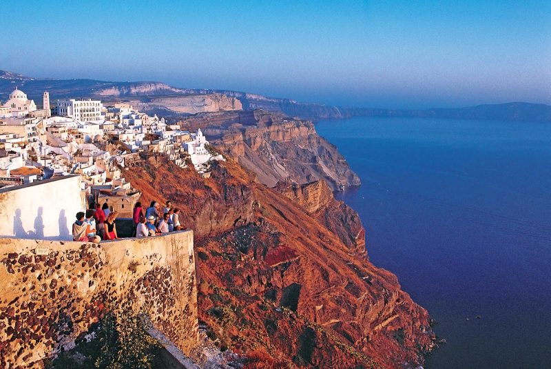 Santorini's cliffsides reveal the area's stunning volcanic past when you visit Greece's most popular island.