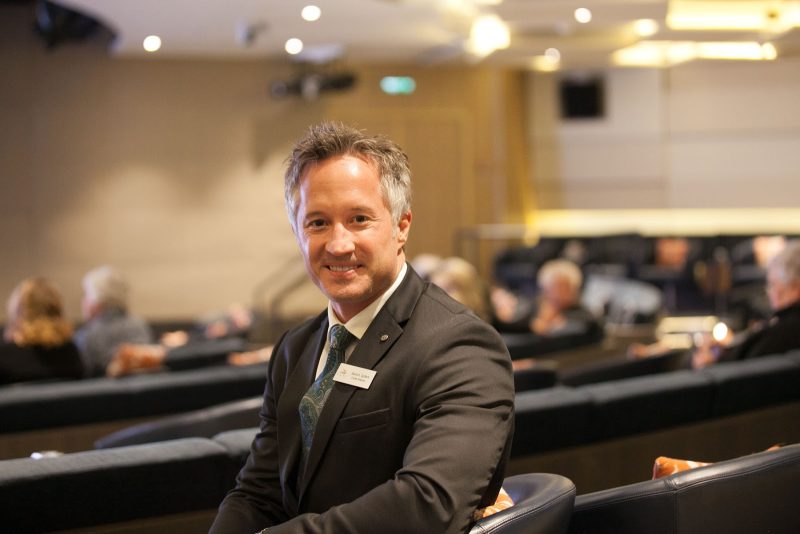 Viking Star cruise director Aaron Syfert in the Star Theater aboard Viking's first ocean ship.