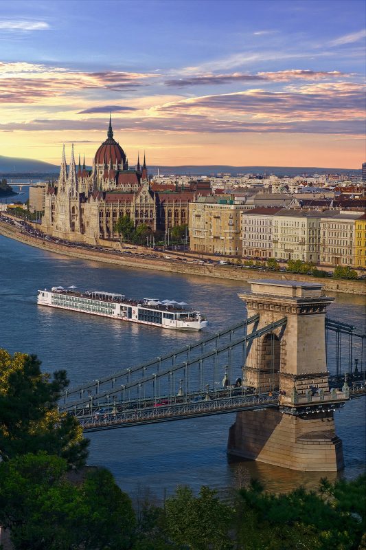 A Viking longship cruises through Budapest