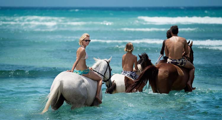 Horseback riding at Half Moon in Jamaica.