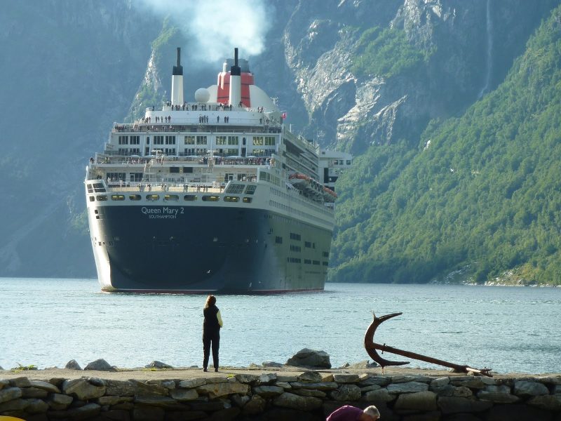 Queen Mary 2 navigates a fjord in Norway. 
