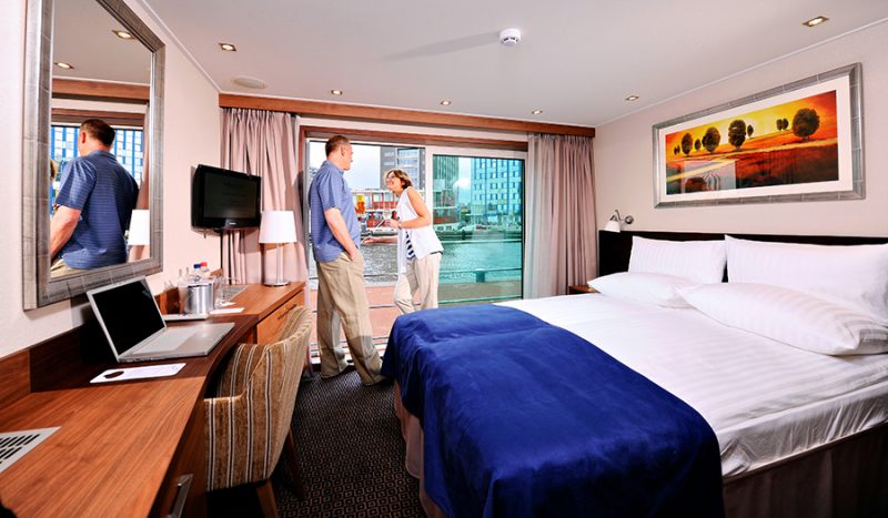 Most staterooms and suites on Avalon Felicity feature French balconies (floor-to-ceiling windows).