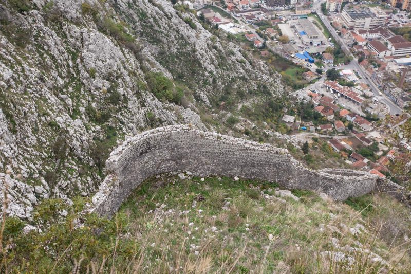 The ruins of centuries-old fortress walls as seen from the Castle of San Giovanni in Kotor, Montenegro.