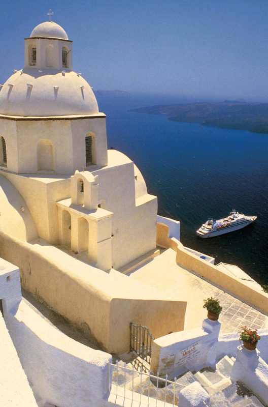 A Seabourn ship in the picture-postcard cruise haven of Santorini, Greece.