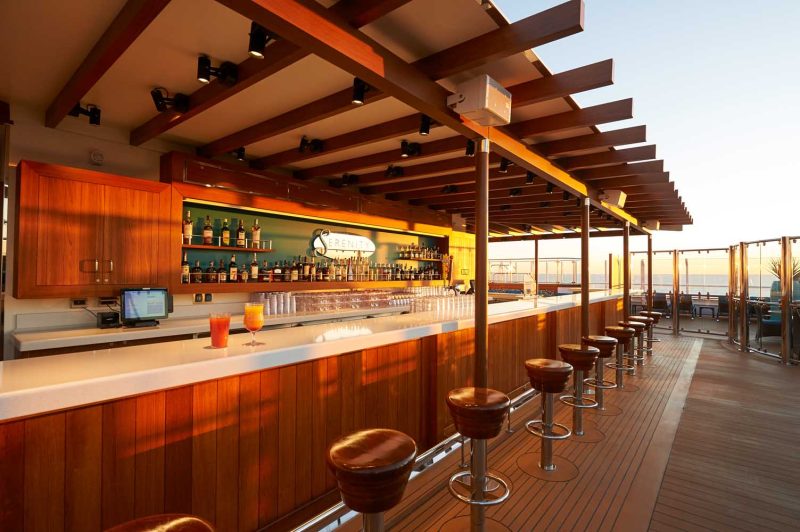Enjoy a quiet lunch or beverage at the Serenity Adult-Only Retreat on Carnival Panorama.
