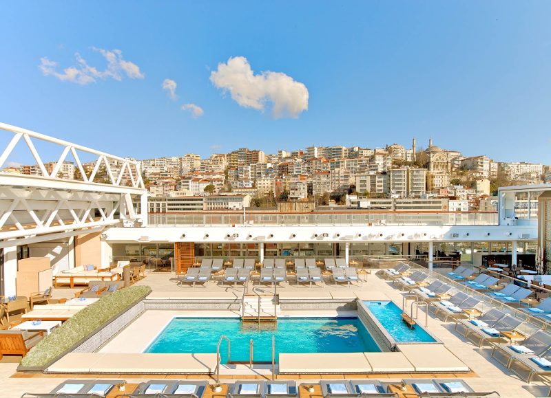 In sunny weather, the roof over the main pool on Viking Star can be opened to let the sun shine.