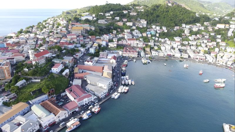 Drone footage of the horseshoe-shaped harbor at St. George's, capital of Grenada. 