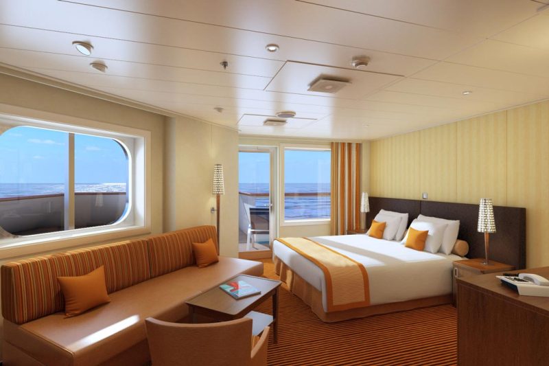 A roomy Junior Suite on Carnival Horizon comes with a balcony and whirlpool tub.