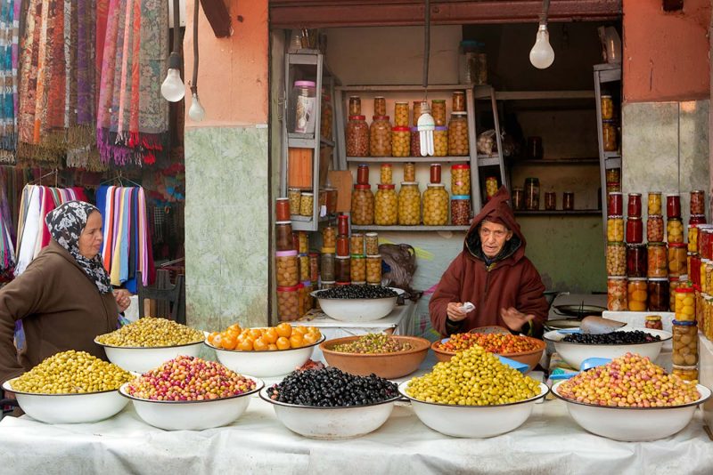 Olives seller from the famous Marrakesh bazaar.
