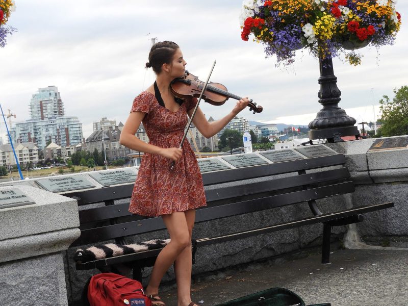 A violinist performs in Victoria, Canada.