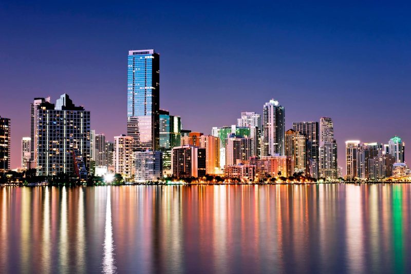 The Miami skyline glitters at night.