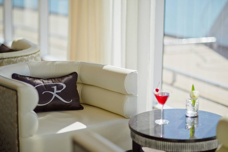 Cocktails in the relaxing Observation Lounge of Seven Seas Mariner.