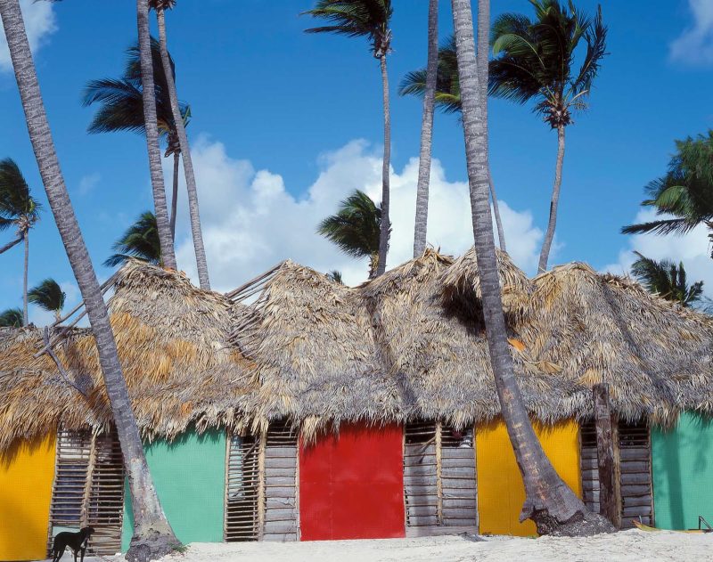 Colorful huts on a Cuban beach.