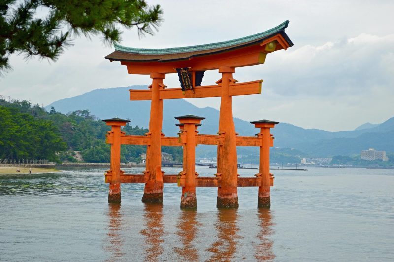 Near Hiroshima, Miyajiima Island is famous for its large red torii gate, which stands on the shore and appears to float during high tide.