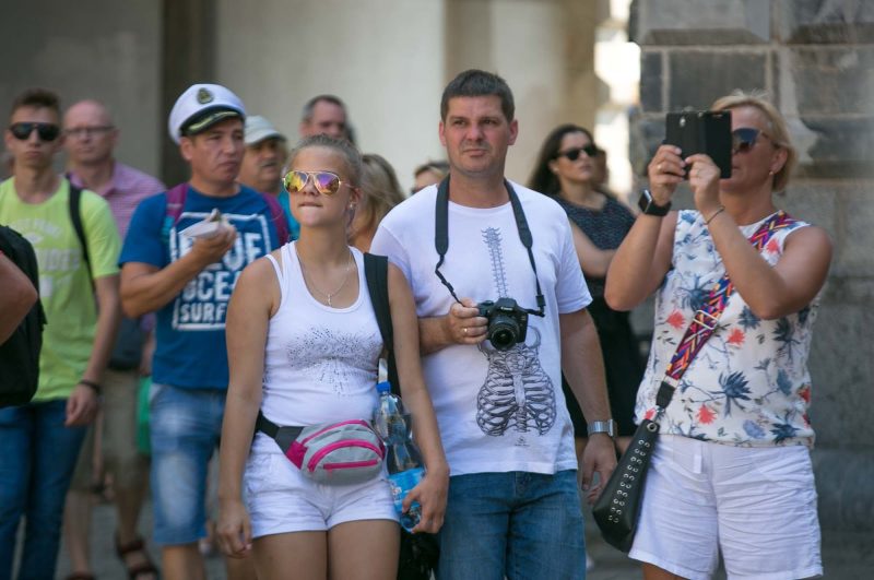 Tourists enter the main square of Old Gdansk, Poland.