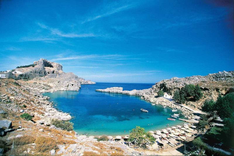 Explore the beautiful beaches and rugged coastline of the Greek island of Rhodes.