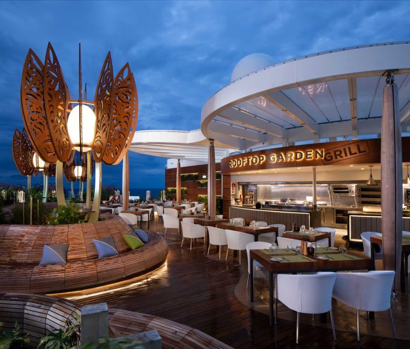 Grab a casual meal at the Rooftop Garden Grill and relax amid live greenery and a sculpture garden on Celebrity Edge.