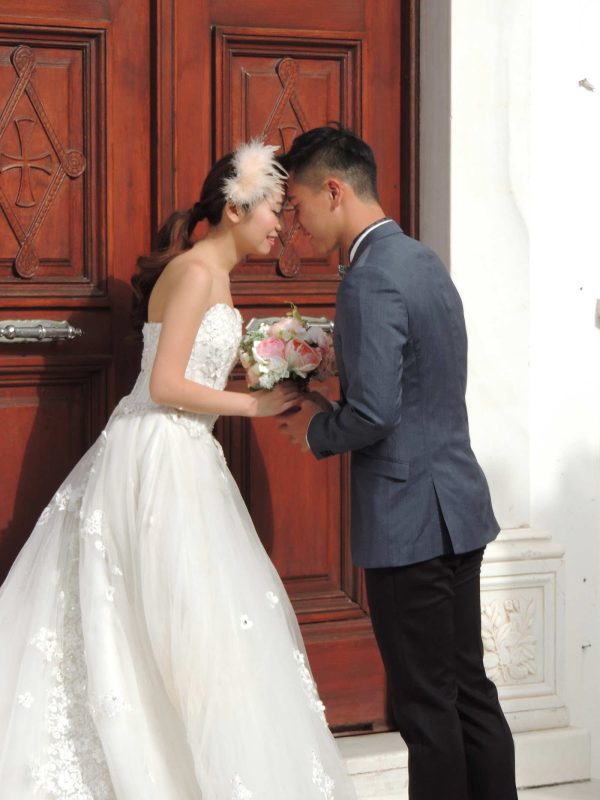 A couple during their wedding day in Santorini, Greece.