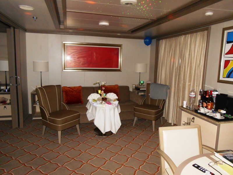Our butler Pedro went all out decorating our suite for our anniversary with disco lights, romantic music and a cake