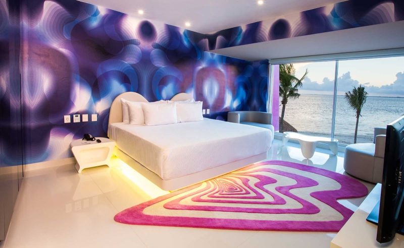 Twelve spacious Seduction Beachfront Suites at Temptation Cancun Resort feature a king bed, 48-inch LED TV, rain shower and an in-room whirlpool.