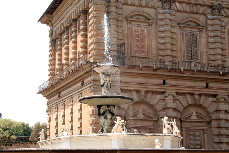 A fountain, with cherubs at the ready, near the entrance of Boboli Gardens in Florence. 