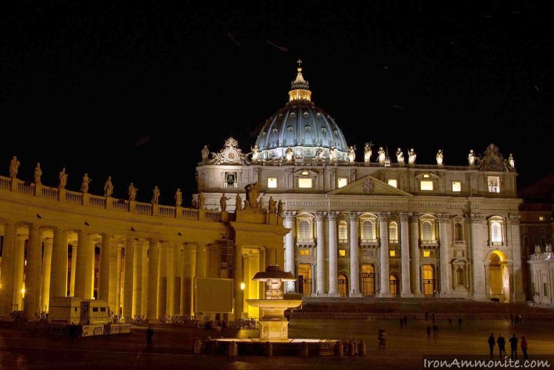 St. Peter's Square in Vatican City at night.