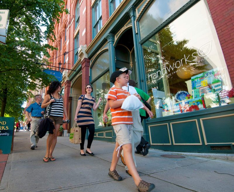 A family goes shopping for household goods and mementoes at stores in uptown Saint John, Canada. 