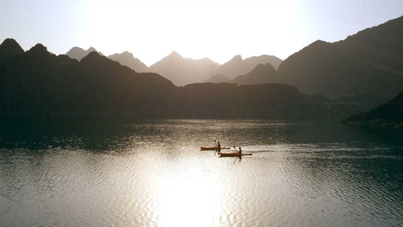 Kayak on a still mountain lake near Dubai.