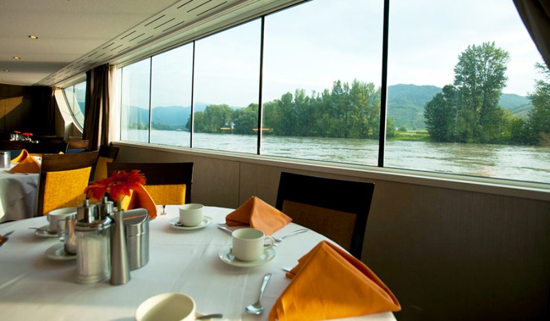 Dine while watching Europe sail by on Avalon Luminary.