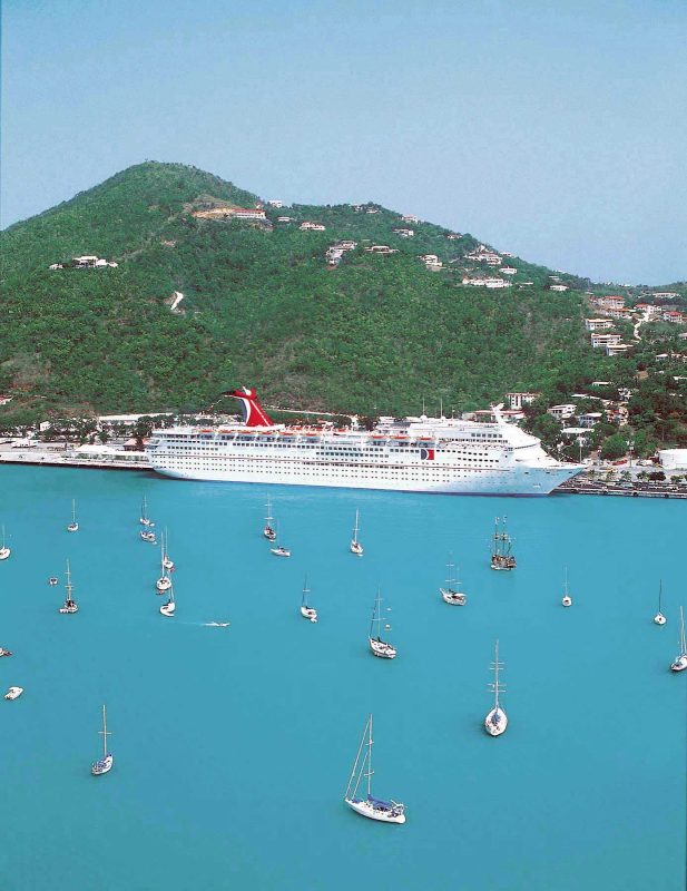 Carnival Ecstasy in port in the warm waters of the Bahamas.