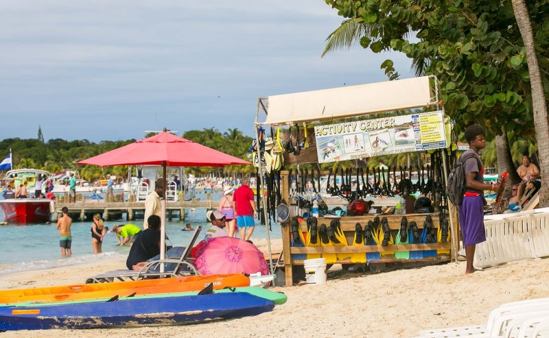 Visitors can choose from a wealth of water activities at West End Beach on Roatan Island, Honduras.