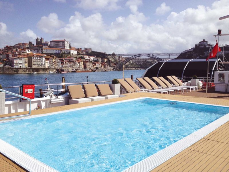 Take a dip in the pool on the sun deck of Uniworld's Queen Isabel.