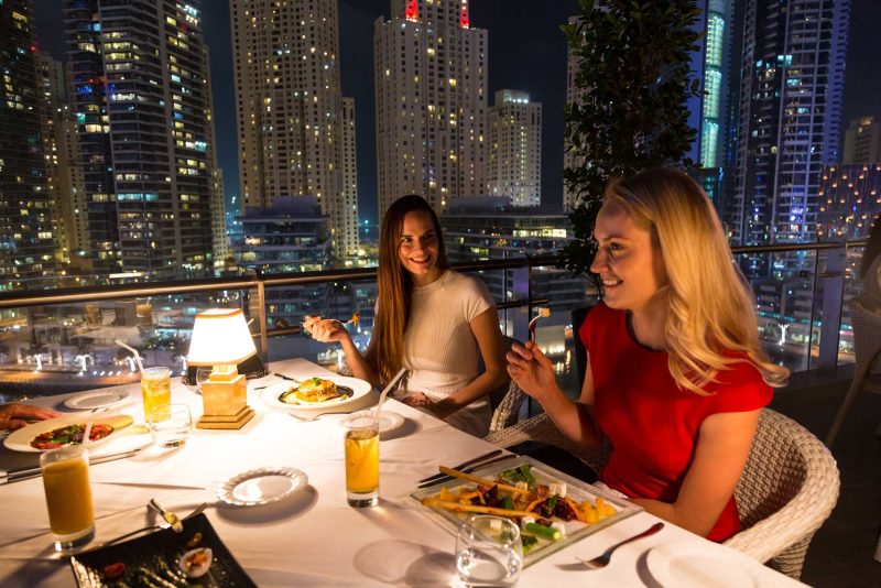 Enjoy late night dining with friends in Dubai.