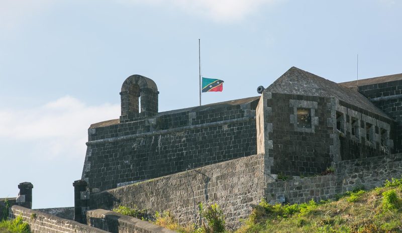 The St. Kitts flag flies at half staff over Brimstone Hill Fortress on St. Kitts.