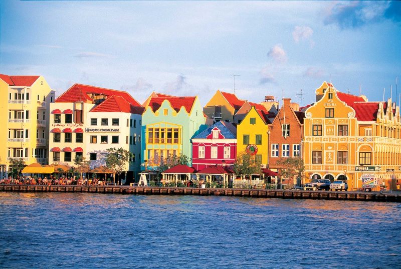 Colorful buildings line the waterfront of the Punda quarter of Willemstad, Curacao, in the Caribbean.