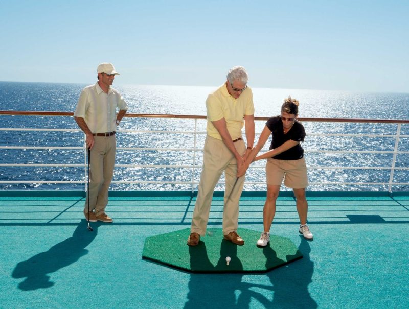 Receive golf tips from an expert trainer during your cruise on Crystal Serenity.