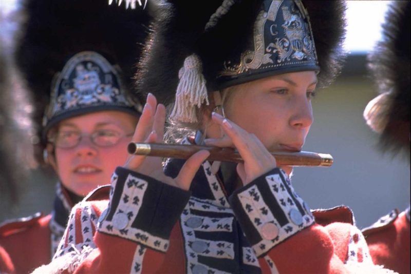 A tradition of St. John's, Newfoundland, a cadet plays fife in the Signal Hill Tattoo, which reenacts the Royal Newfoundland Regiment of Foot 1795.