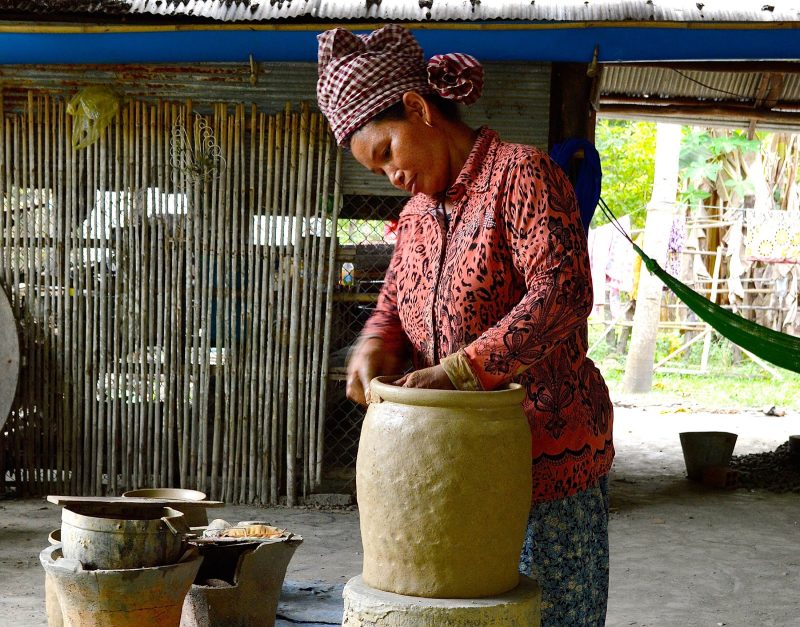  A woman making pottery in Vietnam. Locals have been crafting earthenware like this for thousands of years. 