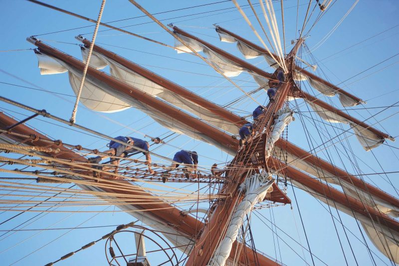 Deck hands ready the ship's sail on National Geographic's Sea Cloud.
