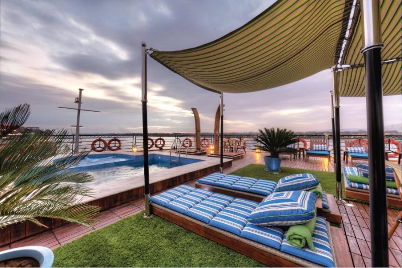 Linger at the pool and Sun Deck of ms Mayfair as you pass historic sites during your voyage on the Nile.