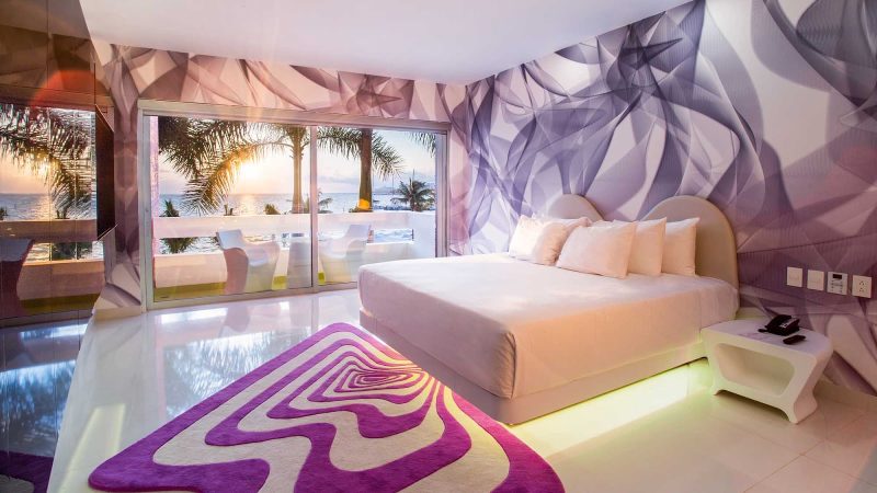 The 153 Trendy Garden View rooms at Temptation Cancun Resort feature a king size bed, intimate living area with a 48-inch LED TV and a bathroom with a refreshing rain shower.