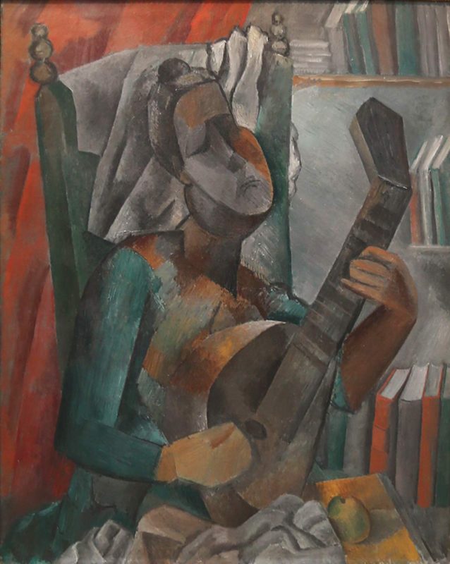 Pablo Picasso, “Woman Playing a Mandolin,” 1909, oil on canvas, at the Hermitage at St. Petersburg, Russia.