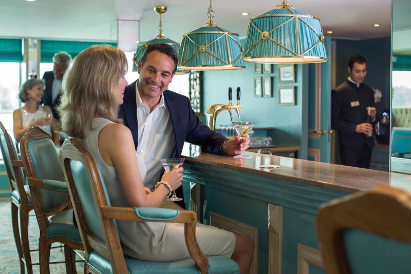 Enjoy intimate pre-dinner cocktails in the River Countess bar while discovering the charm of Italy on a Uniworld river cruise.