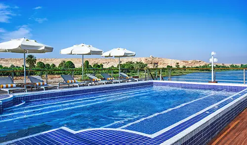Enjoy the pool (still a rarity on a river ship) during your voyage on the Nile River aboard Oberoi Philae.