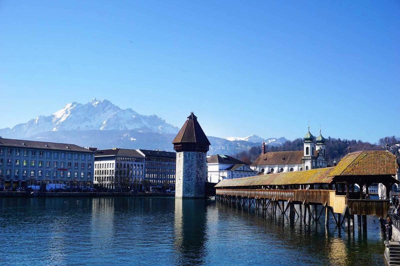 The waterfront in Lucerne, Switzerland, with the Alps in the background.